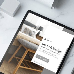 computer desk with globe and flower